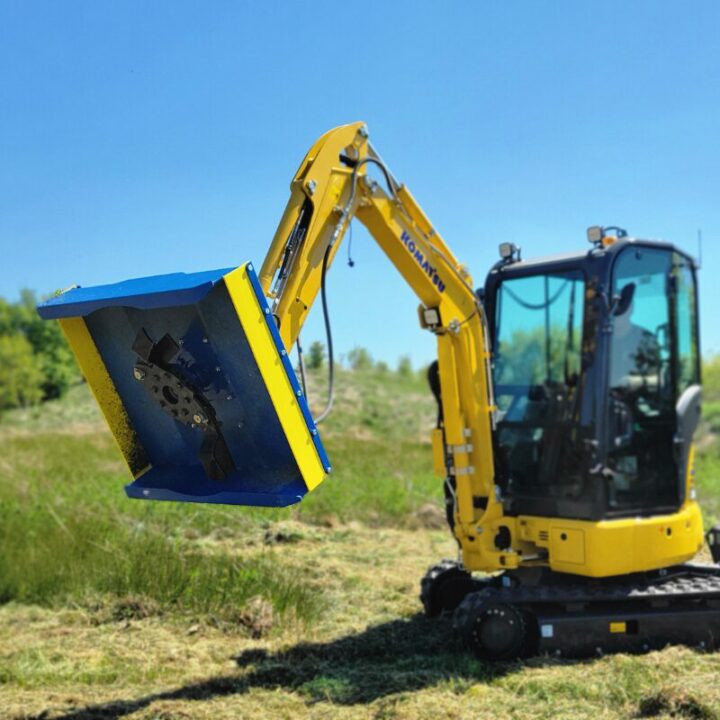 Slanetrac FH80 flail cutter attached to mini digger cutting hedge