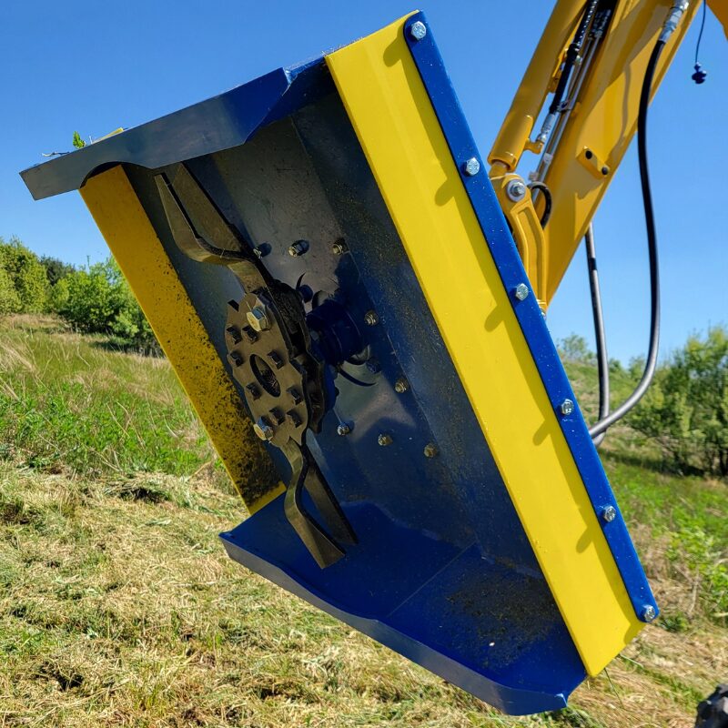 Close-up view of individually replaceable cutting blades on Slanetrac flail